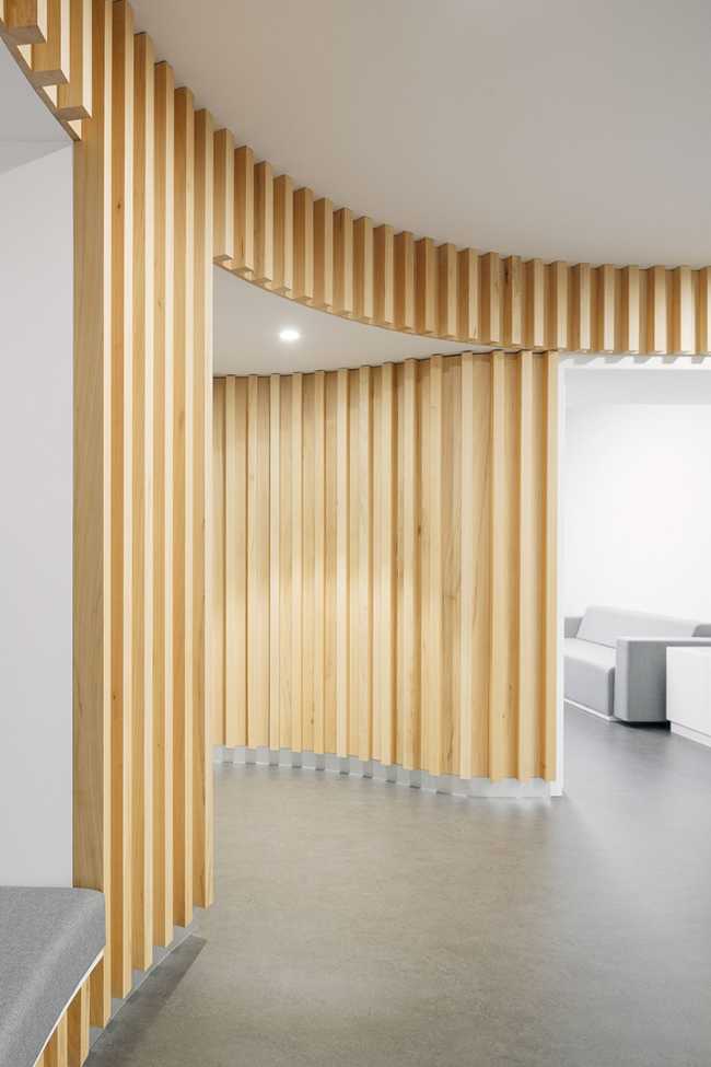 Circular wooden interior wall cladding