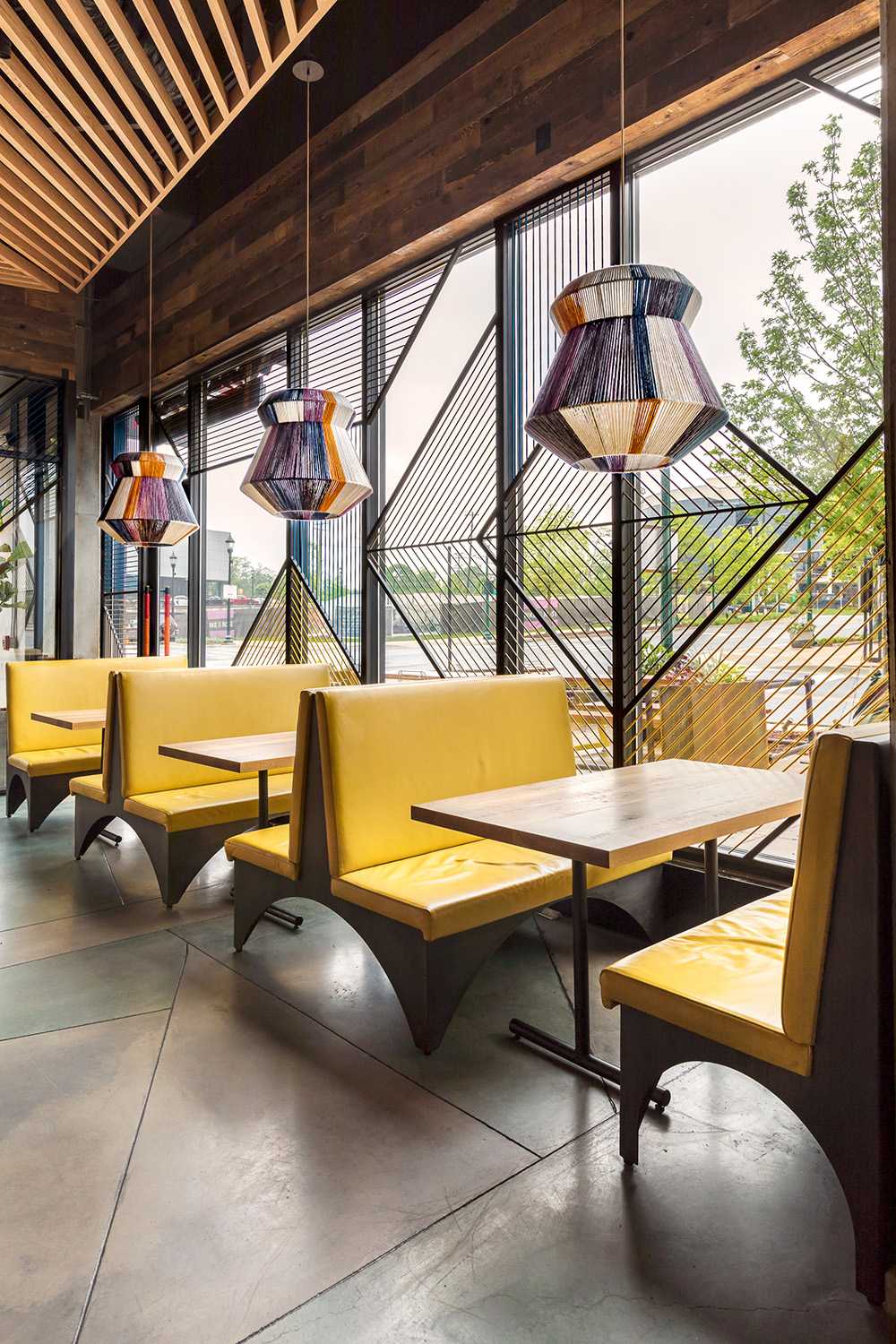 Restaurant with colorful and wooden interior