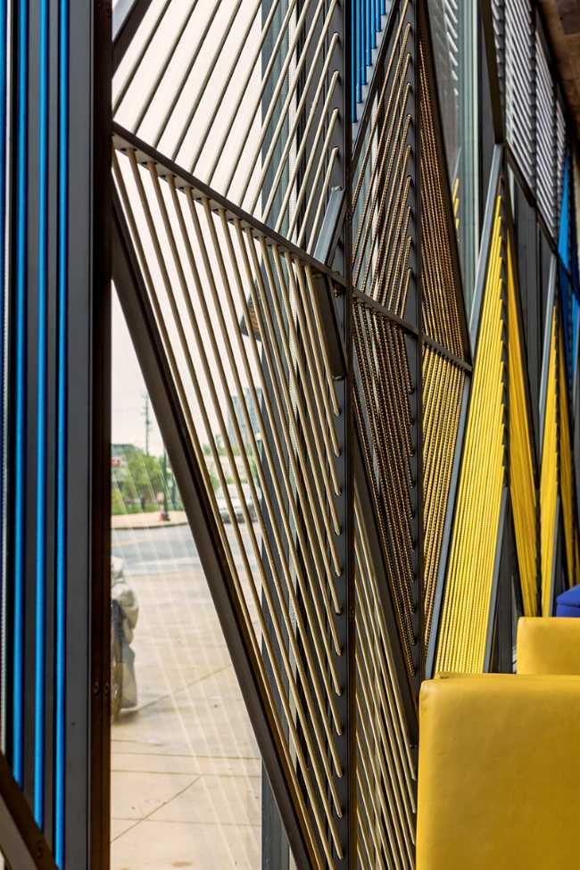 Detail of yellow wire facade