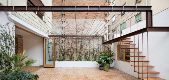 Inner courtyard with metal structure and staircase