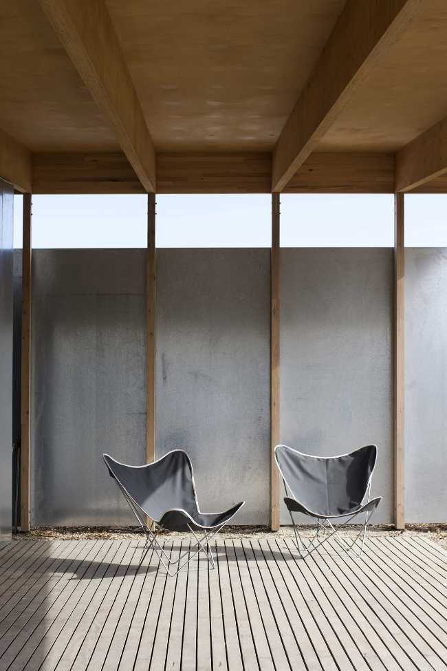 Wooden terrace with two chairs