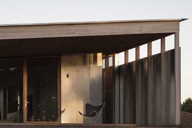 Wooden terrace with two chairs