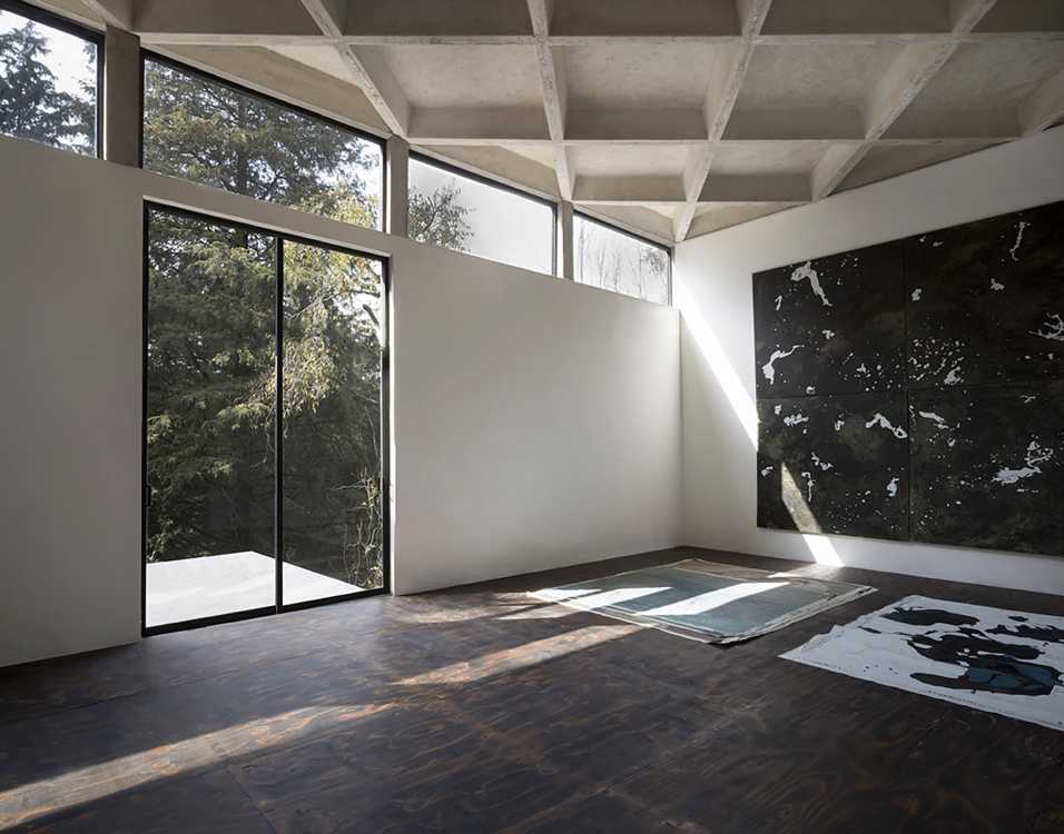 Roel Studio soffitto esterno travi e vetro