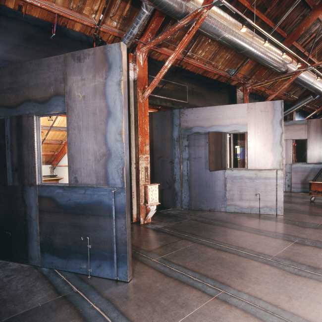 Mobile walls in an industrial style office