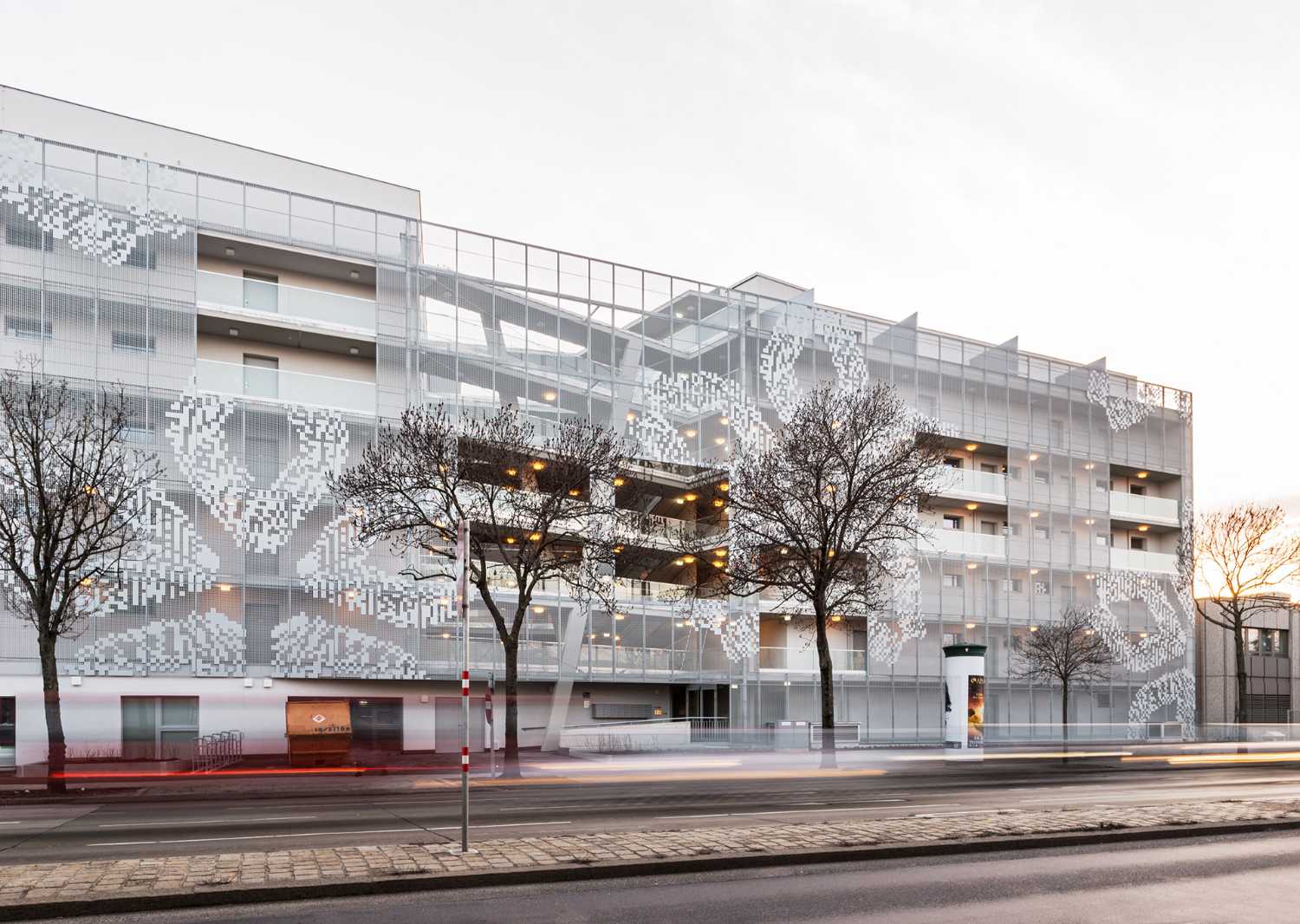 Residential complex with perforated sheet facade