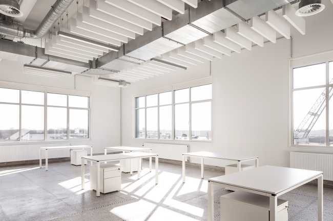 open space offices of a converted industrial building