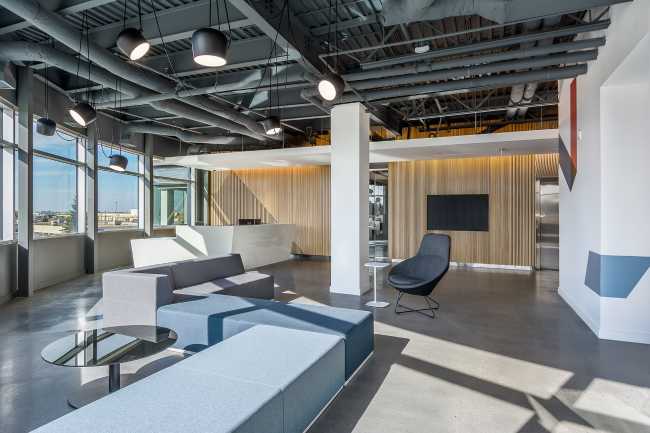 waiting room offices with wood upholstery and continuous upholstered seats