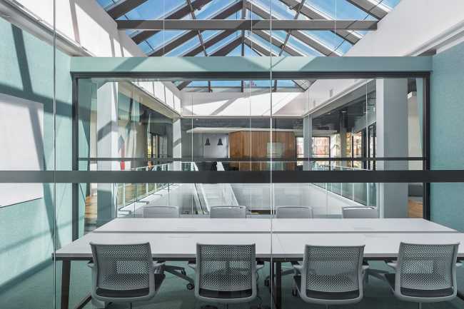 offices meeting room glass walls and skylight