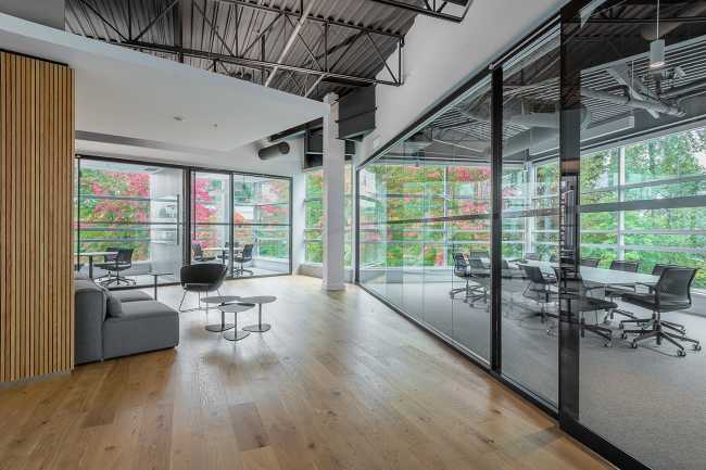 offices glazed wall wood and industrial concrete floors