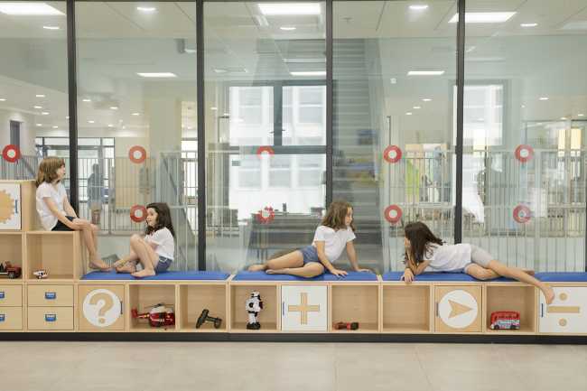 school including custom-made wooden furniture