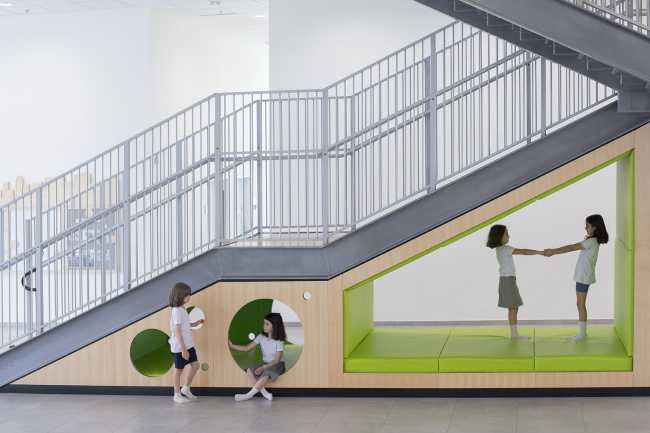 inclusive school play areas under stairs