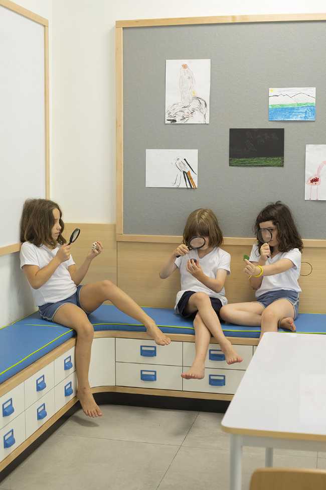 inclusive school study room containing wooden benches