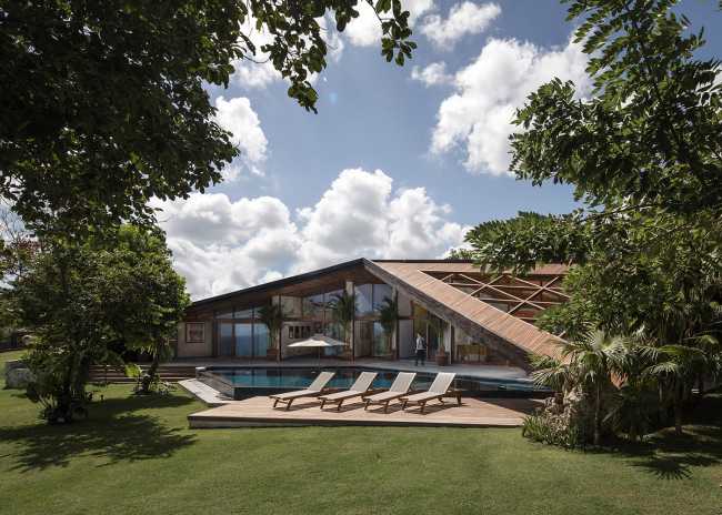 Modern villa with broken lines surrounded by nature