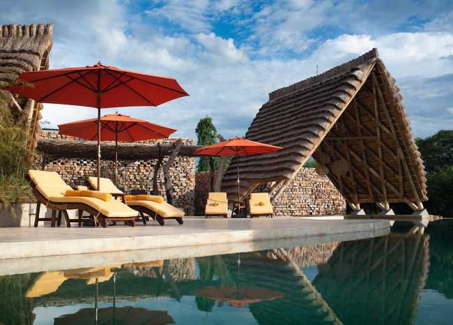 Lodge in legno sul fiume