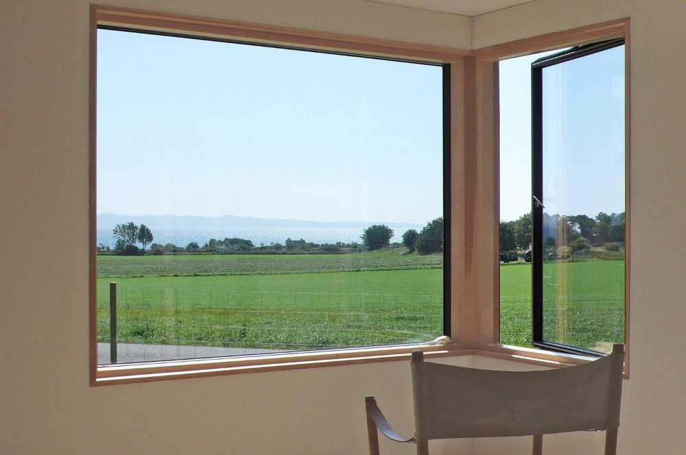 Cabina in legno facciata con pannelli di larice