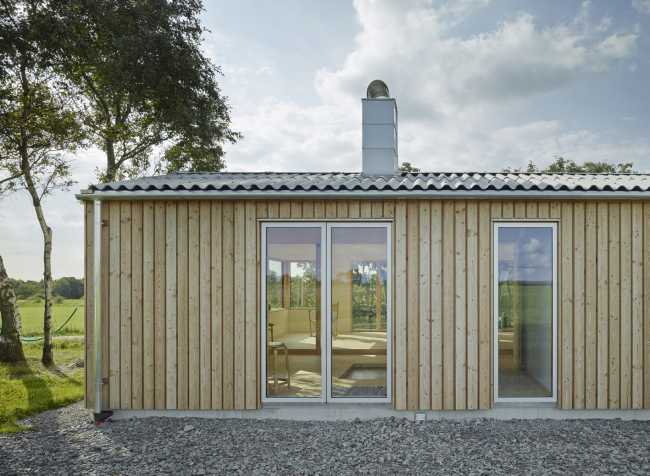 Cabina in legno facciata con pannelli di larice