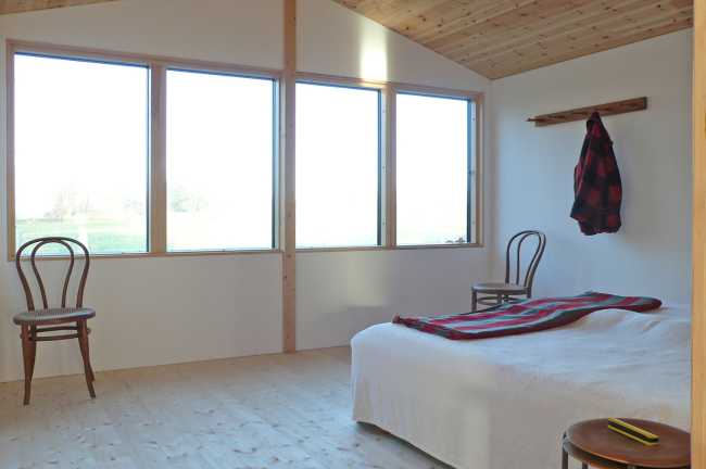 Camera da letto e grande vetrata