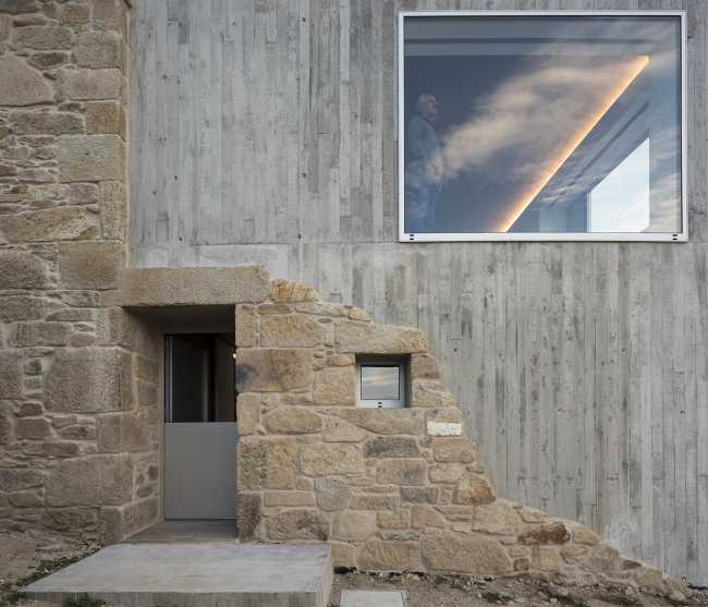 Volumen de hormigón añadido a uno de piedra