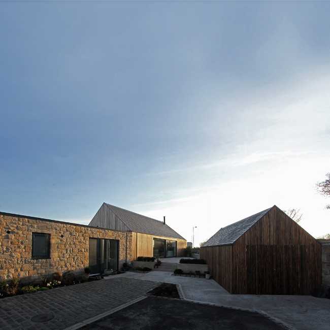 Abitazione con forma a timpano