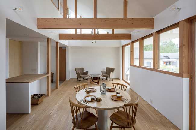 Interior house in white plaster wood and wooden beams