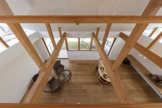 wooden house with exposed beams