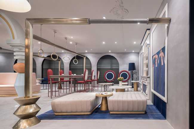 co-working hall atrio imbottiti finiture metalliche oro