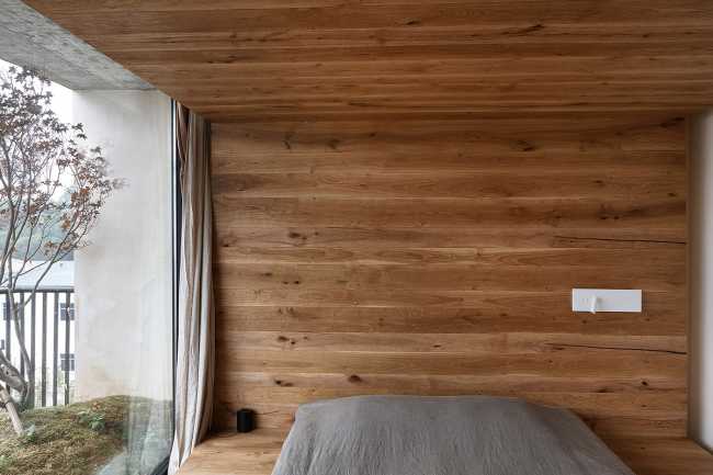 camera da letto rivestimento parete soffitto pavimento legno vetrata terrazza