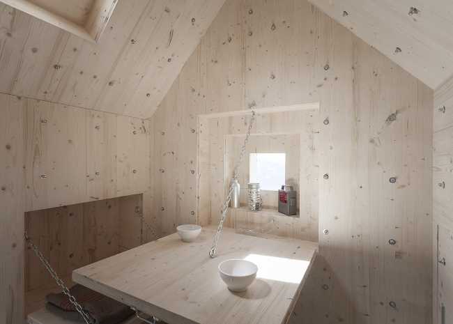 modulo abitativo cemento interno rivestimento e arredi a scomparsa in legno