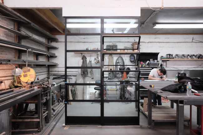 open space loft new york parete vetro e metallo produzione artigianato