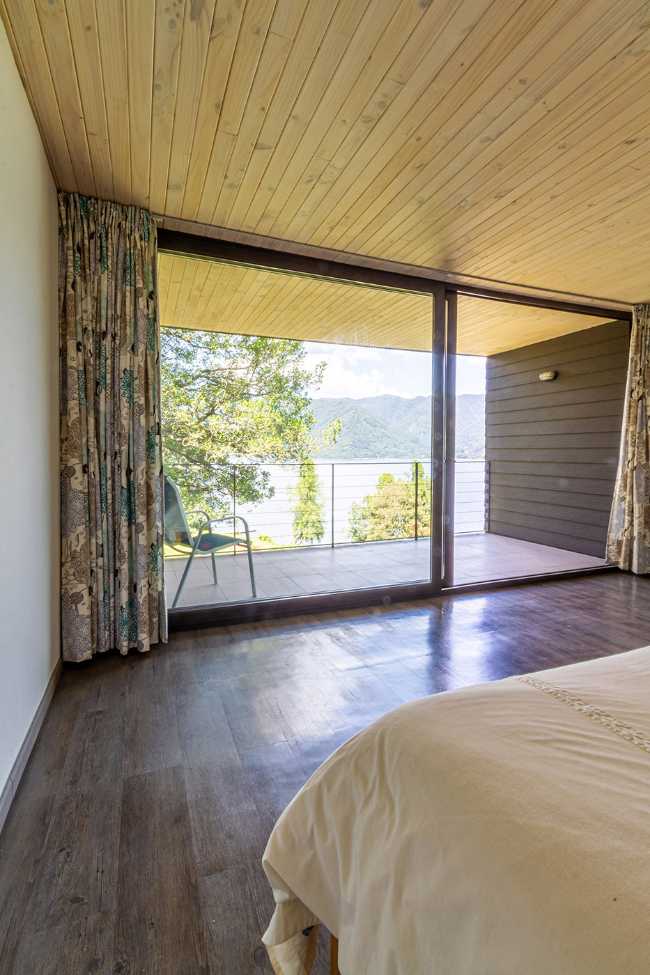 Bedroom with glass window