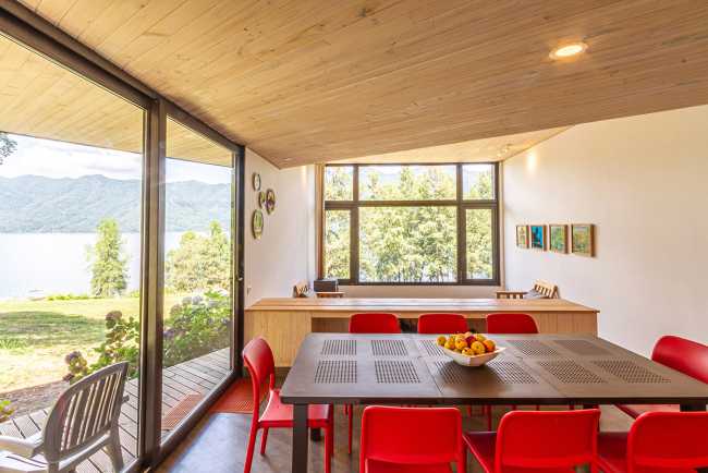 Wooden interiors with red chairs