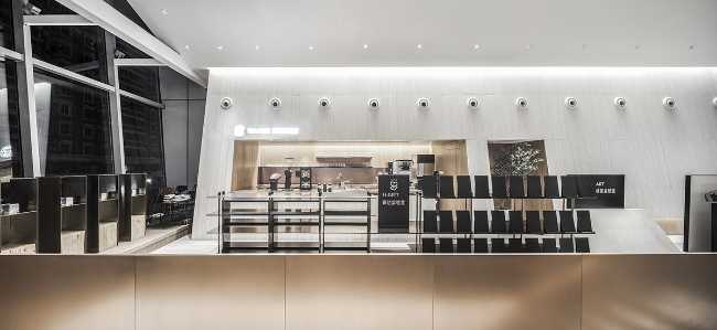 negozio Flagship Store Heytea arredi in metallo nero