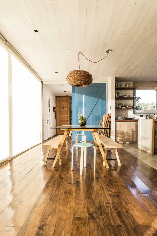 house view ocean structure wood table and chairs