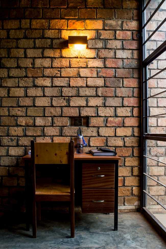 University residence structure wooden brick room desk wall glass