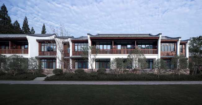 entrance hotel historical china facade finishes and wooden balconies