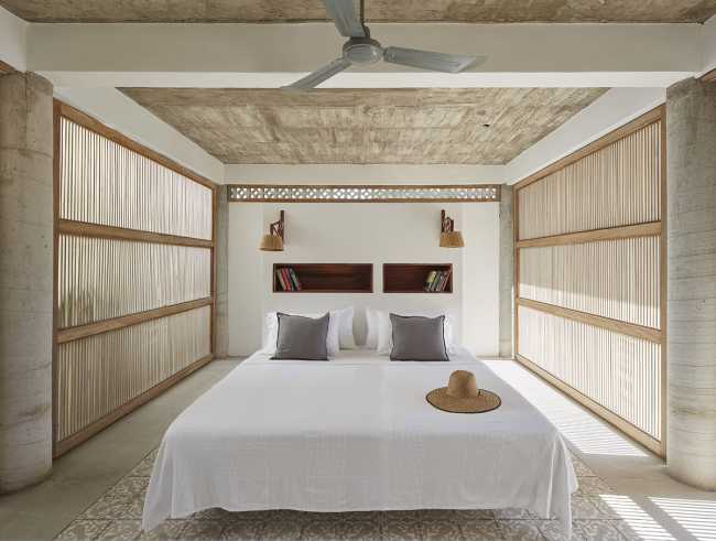 Camera da letto legno e cemento