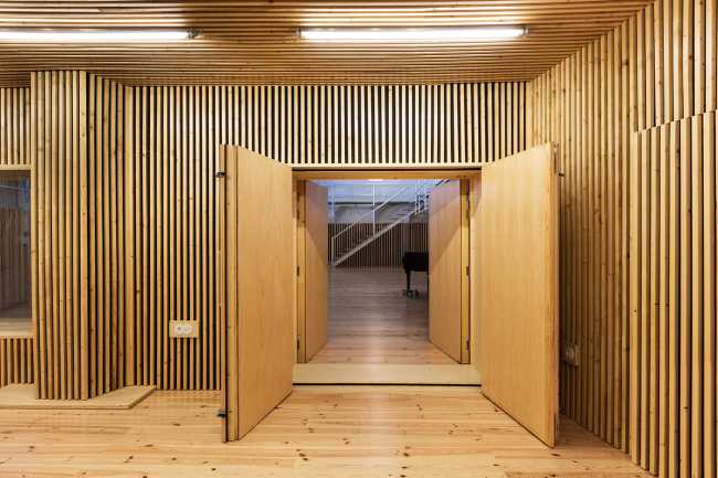 Interior multifunctional center in wooden slats