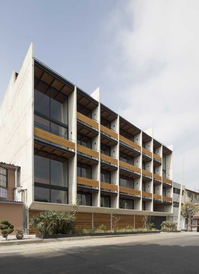 residential complex structure reinforced concrete brick view terrace wood cladding