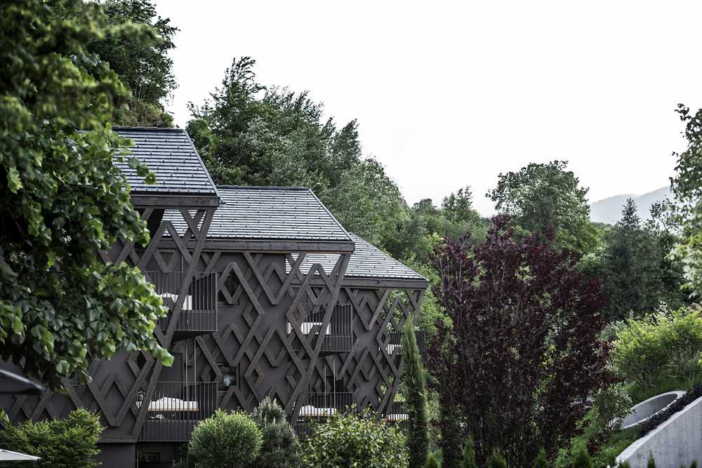 hotel facade cladding structure hexagonal wood