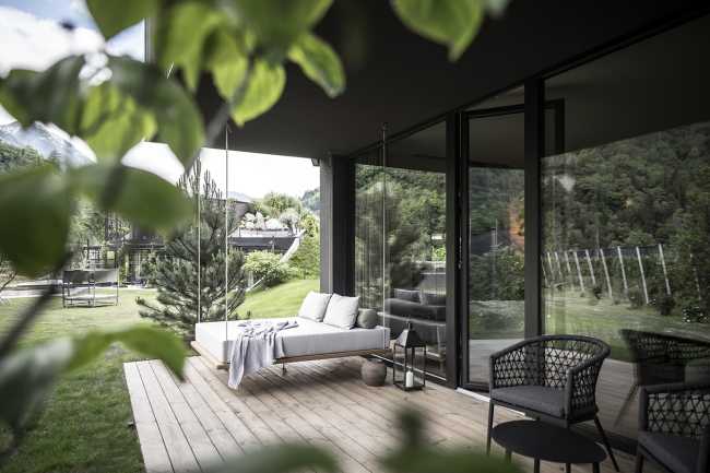 hotel suite veranda wood floor outdoor furniture