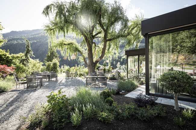 hotel suite glass and metal modules garden