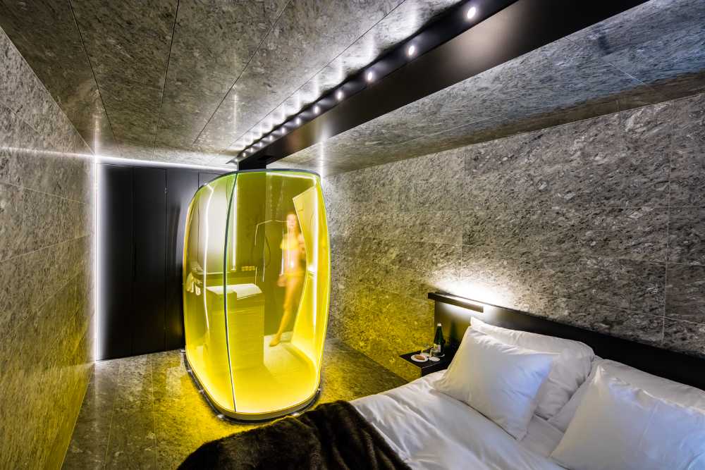 suite lusso hotel rivestimento pietra vista parco