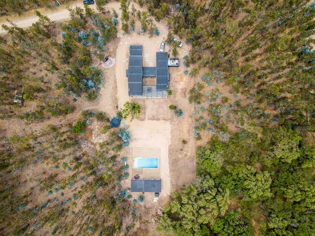 Wooden dwelling among the trees