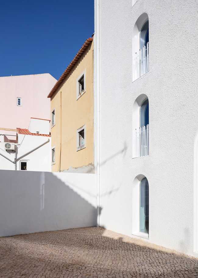 Facade with arched window