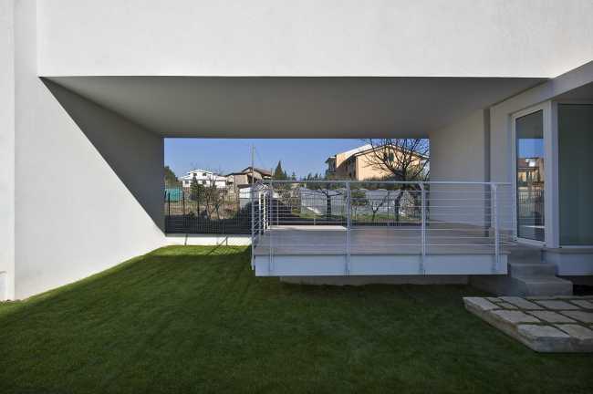 minimalist house volumes extension bridge garden