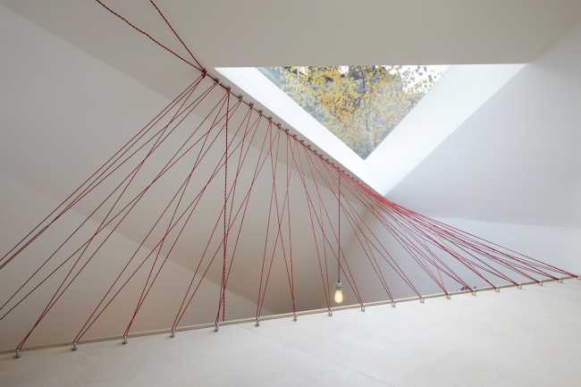 double volume loft staircase wood cables red