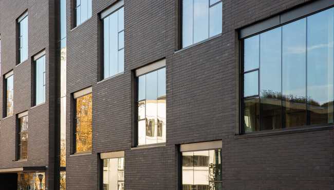 edificio struttura clt rivestimento laterizio mattoni