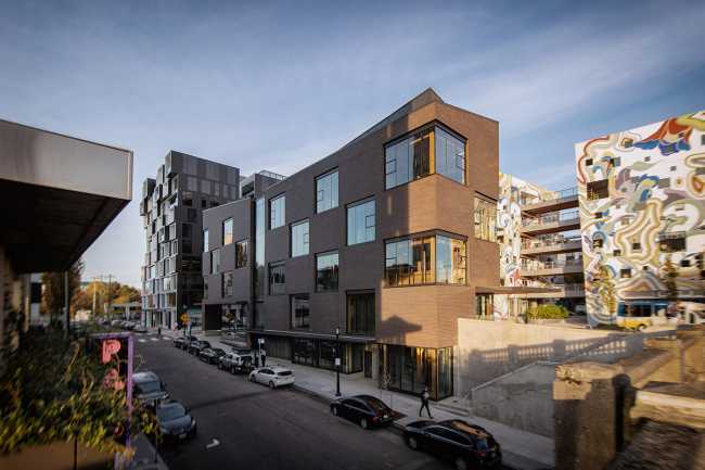 edificio struttura clt rivestimento laterizio mattoni