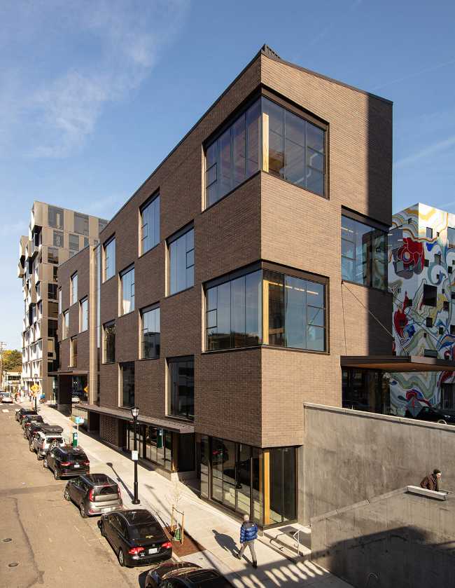 edificio struttura clt rivestimento laterizio mattoni