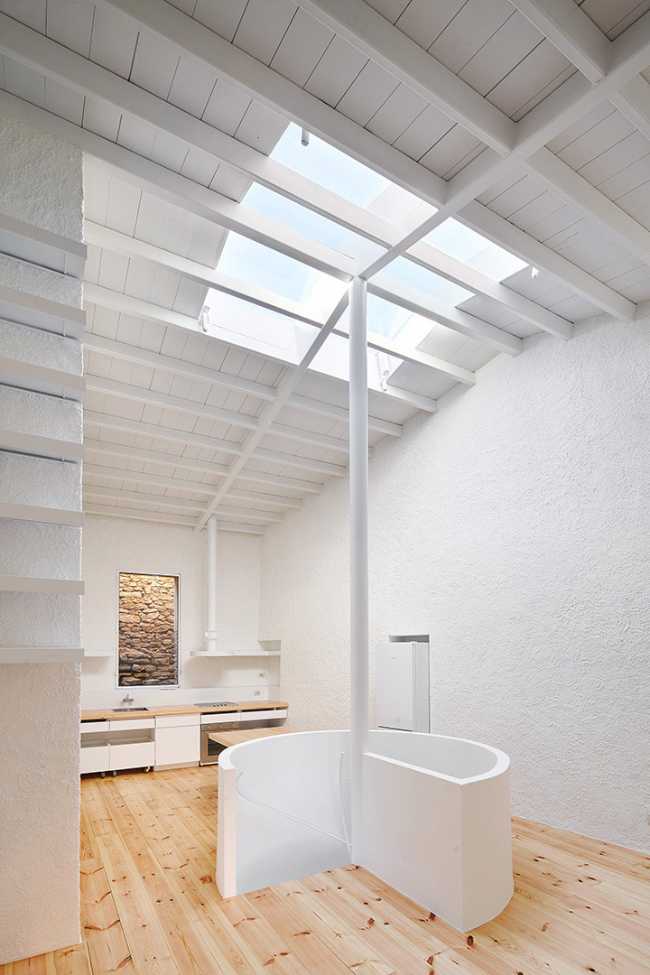 house interior with central spiral staircase